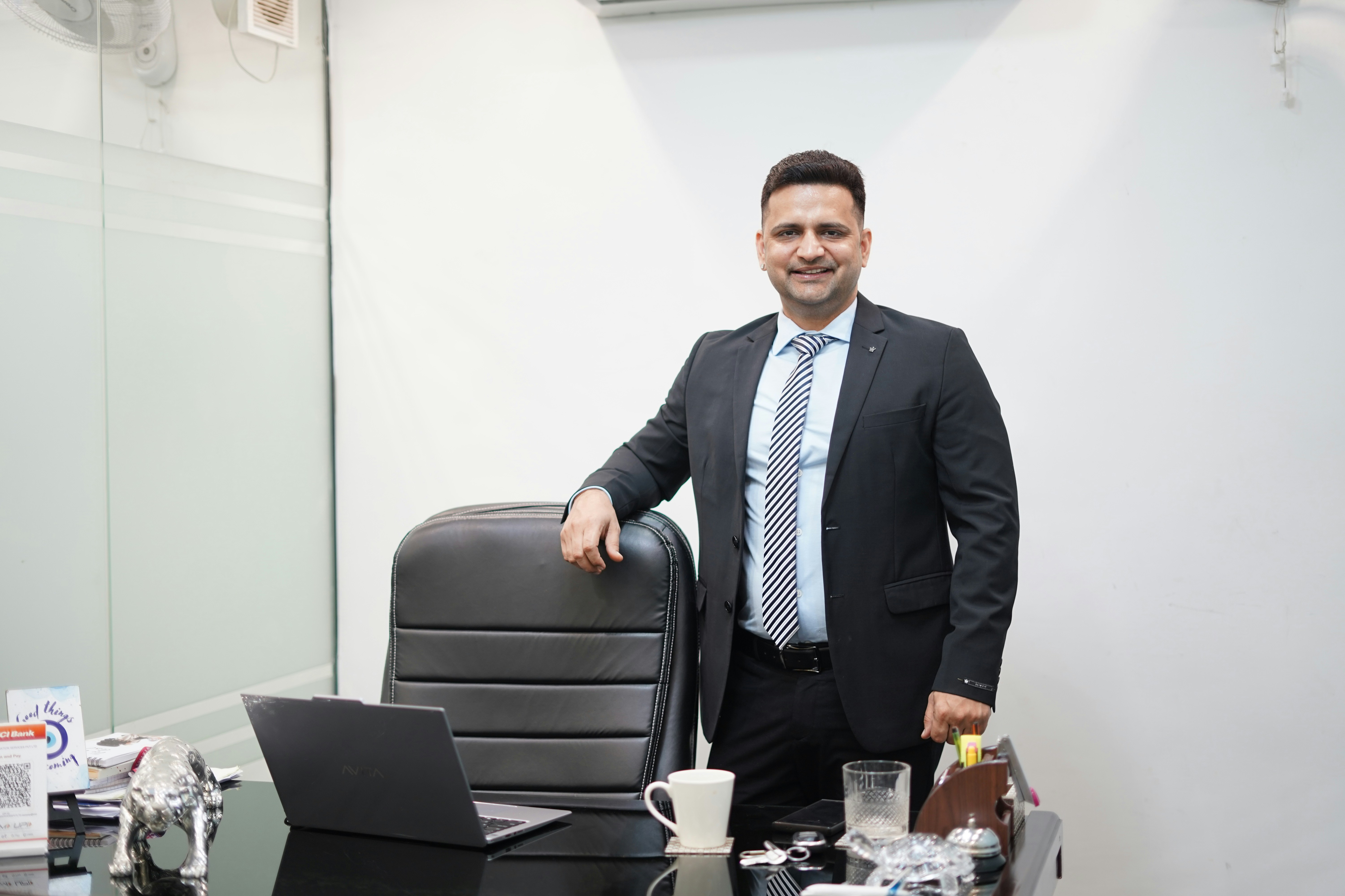 Financial professional in their office with documents and figures