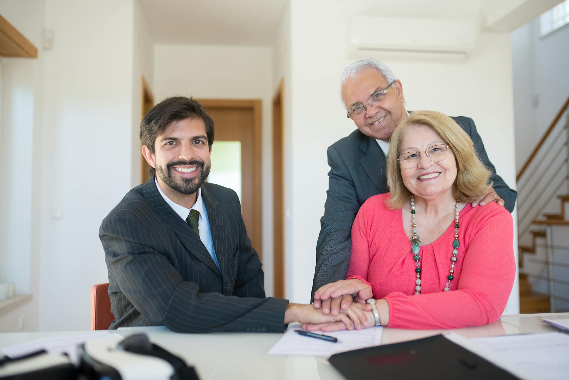 Mexican family receiving financial guidance from a consultant