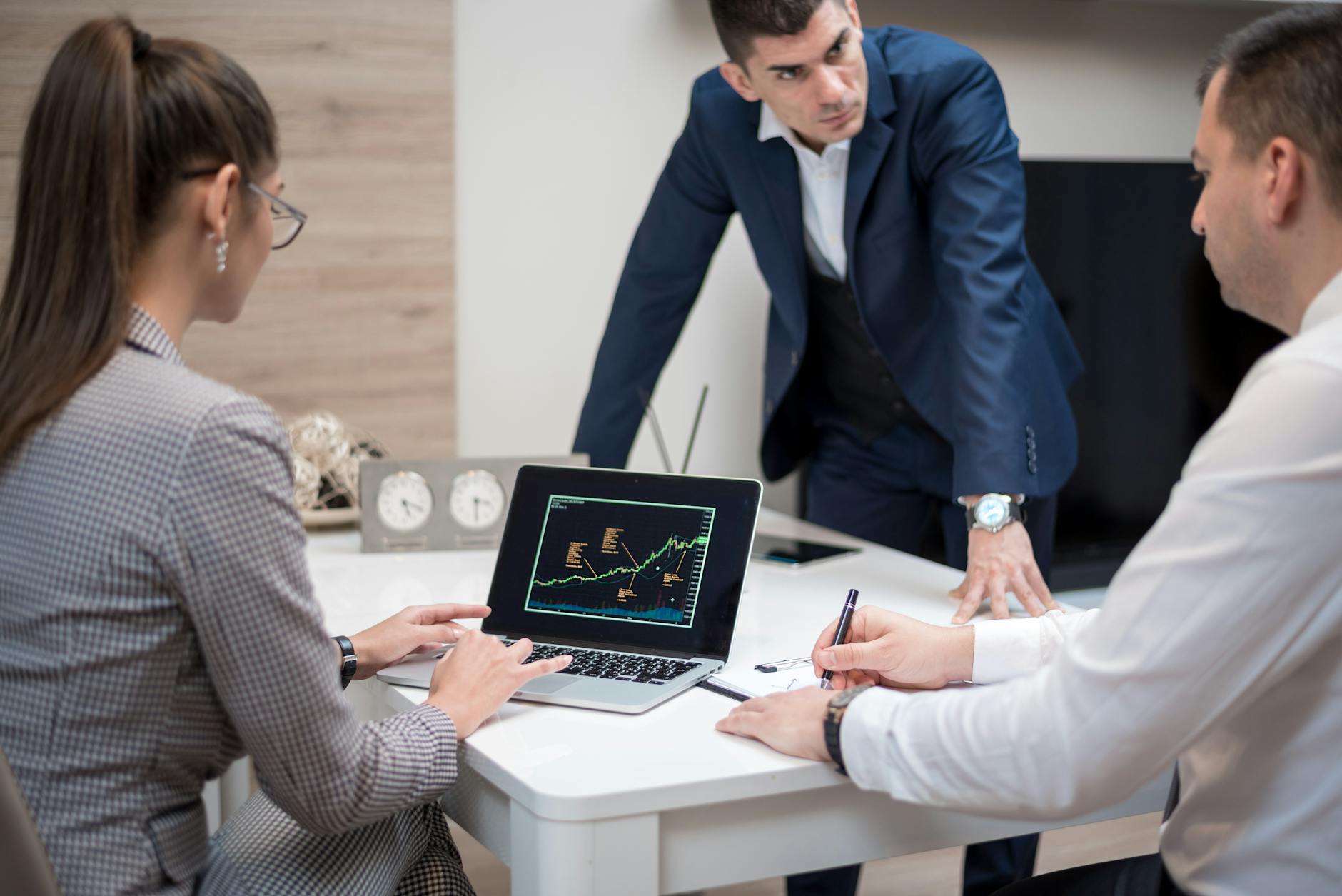 Consultant explaining a chart