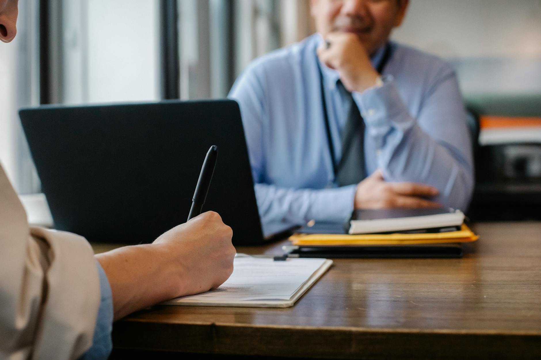 Consultant explaining an official document to a family